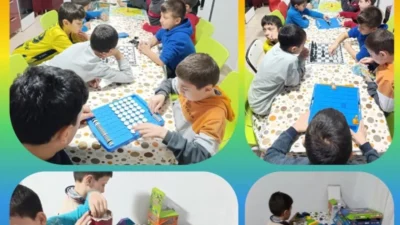 Bandırma Hicri Ercili Çocuk Evleri'nde çocuklar için düzenlenen masa oyunları